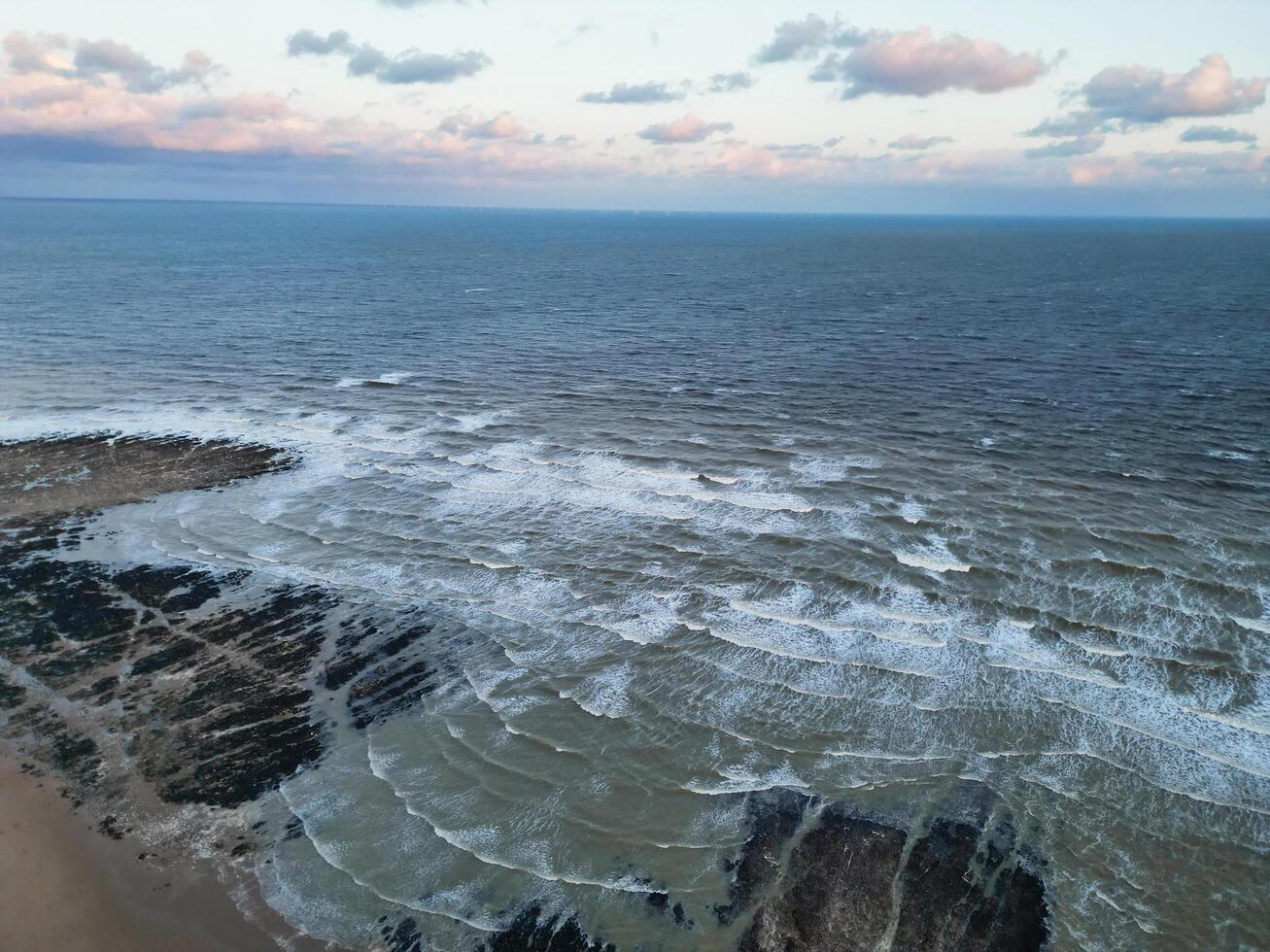High Angle View of Botany Bay Beach and Sea View During Sunset at Broadstairs Kent, England UK. April 21st, 2024 photo
