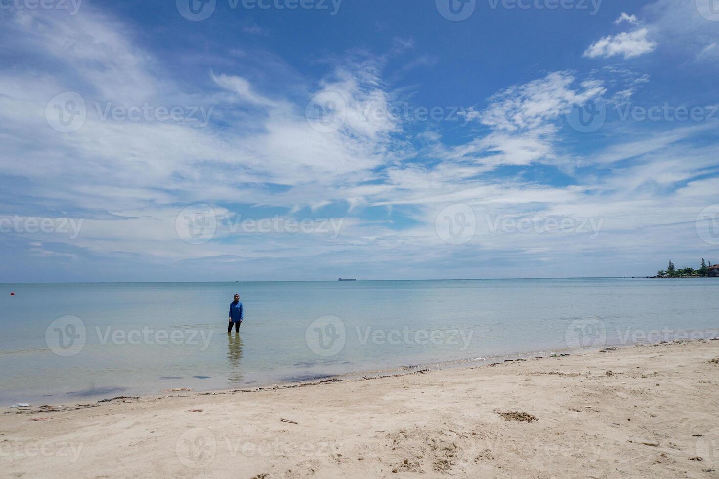 looks beautiful from the coastline with a clear sky background for copy space. photo