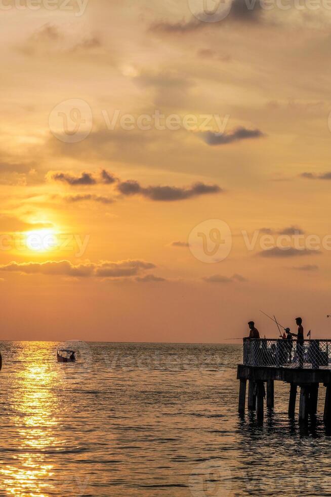 sunlight reflecting on the sea surface at dusk. photo