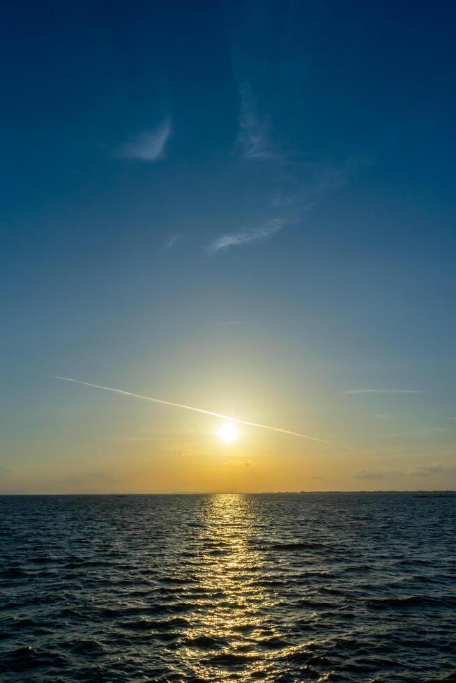 Sunset sky on the lake photo