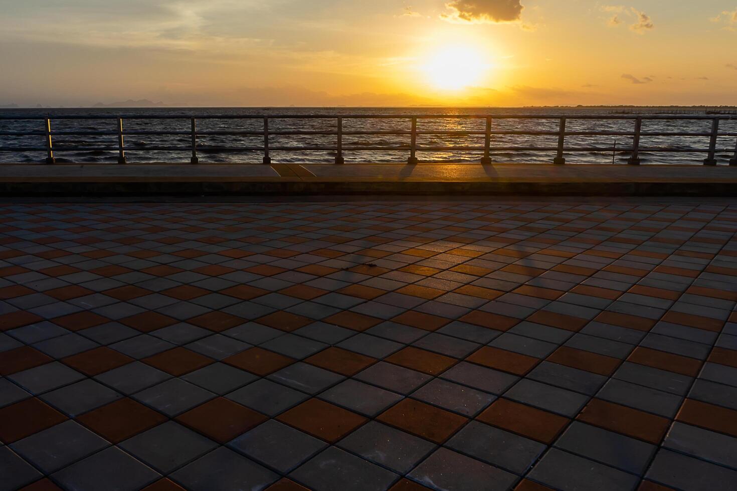 Sunset view with iron fence photo
