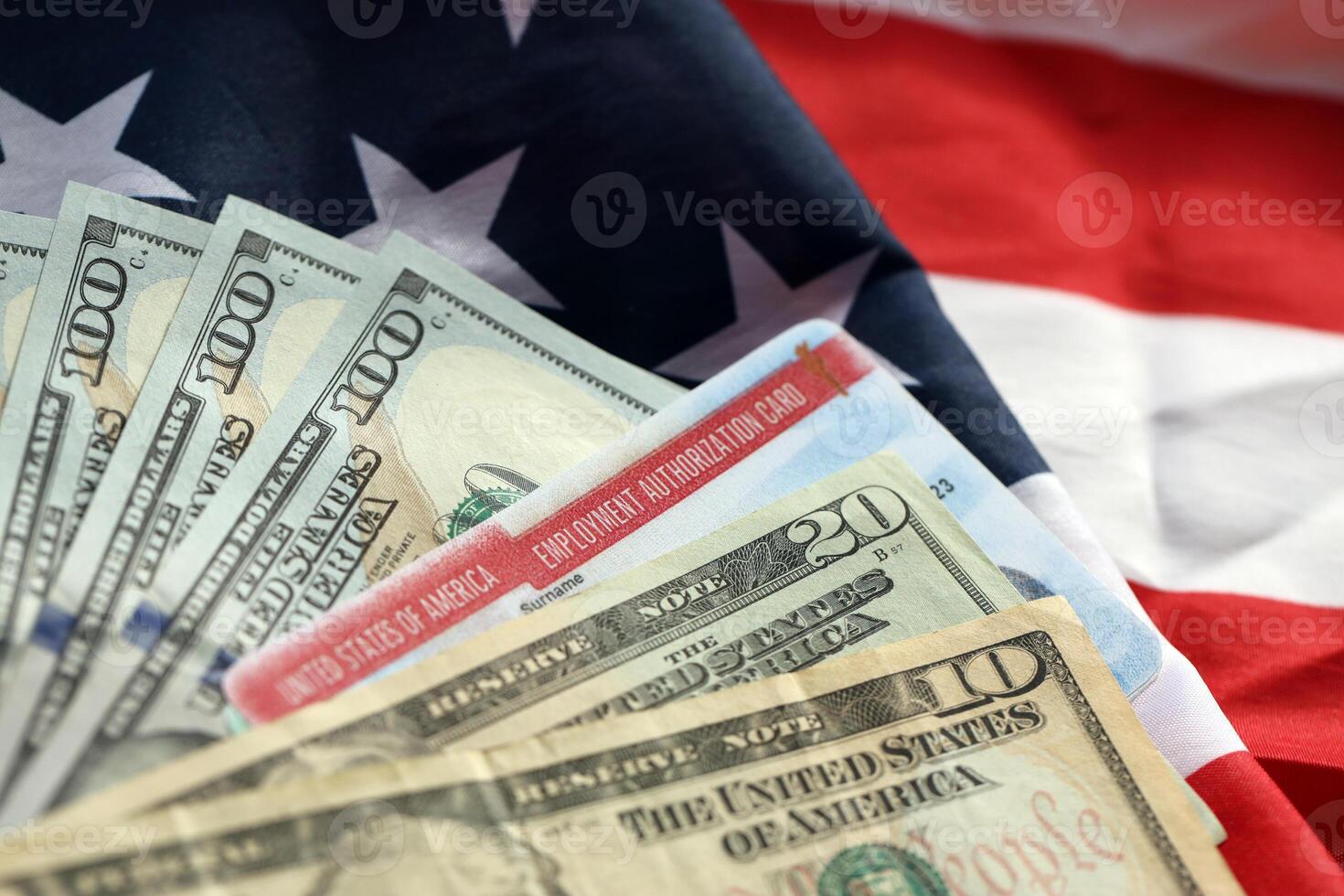 Employment Authorization Card United States of America Work Permit and dollar bills on flag photo