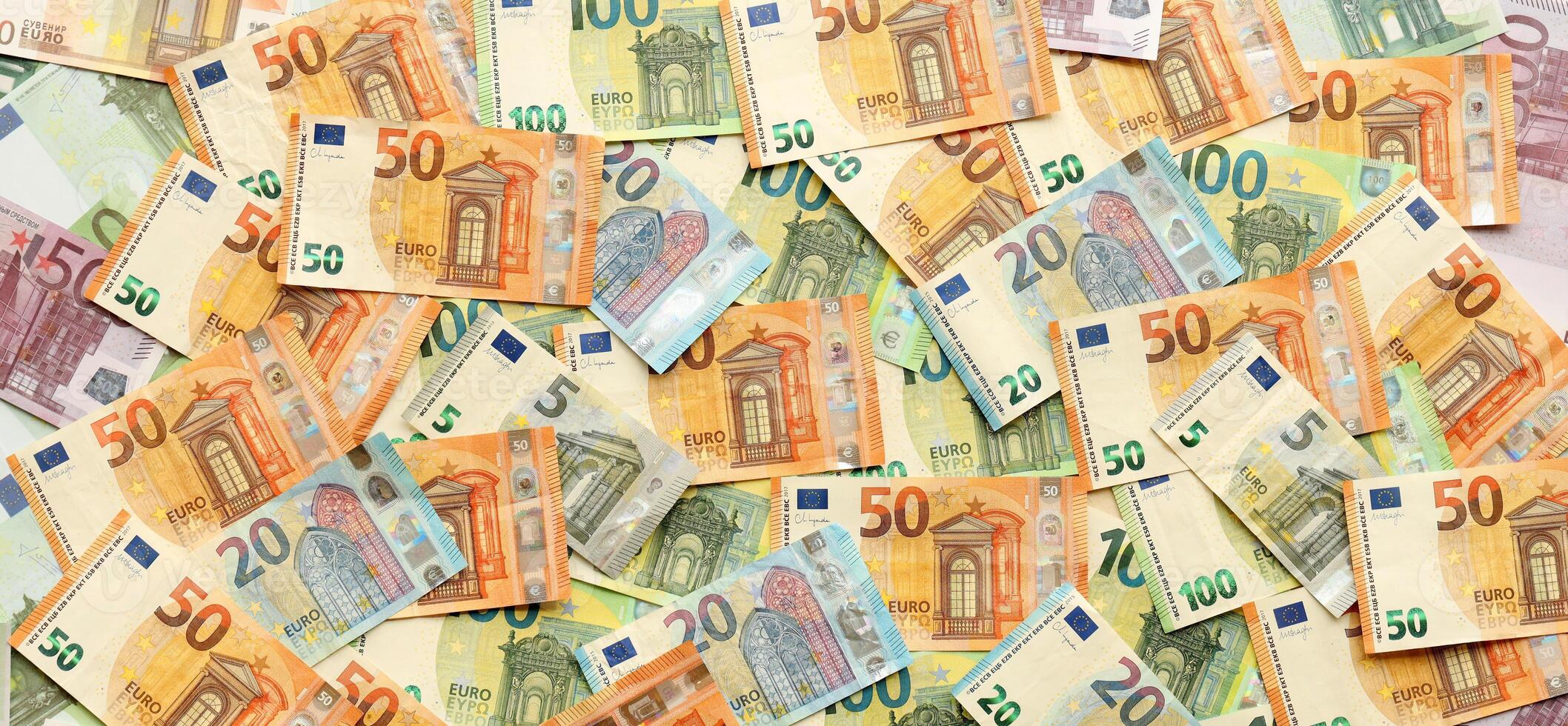 Many european euro money bills. Lot of banknotes of european union currency photo