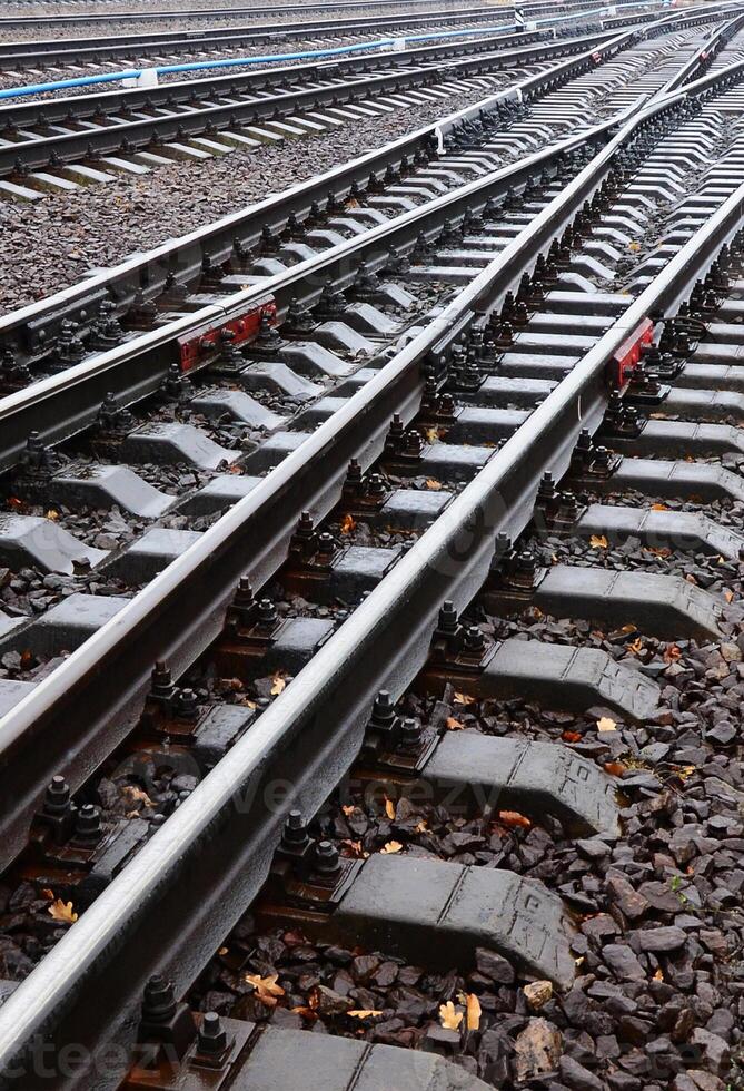 Photo fragment of the railroad tracks in the rainy weather