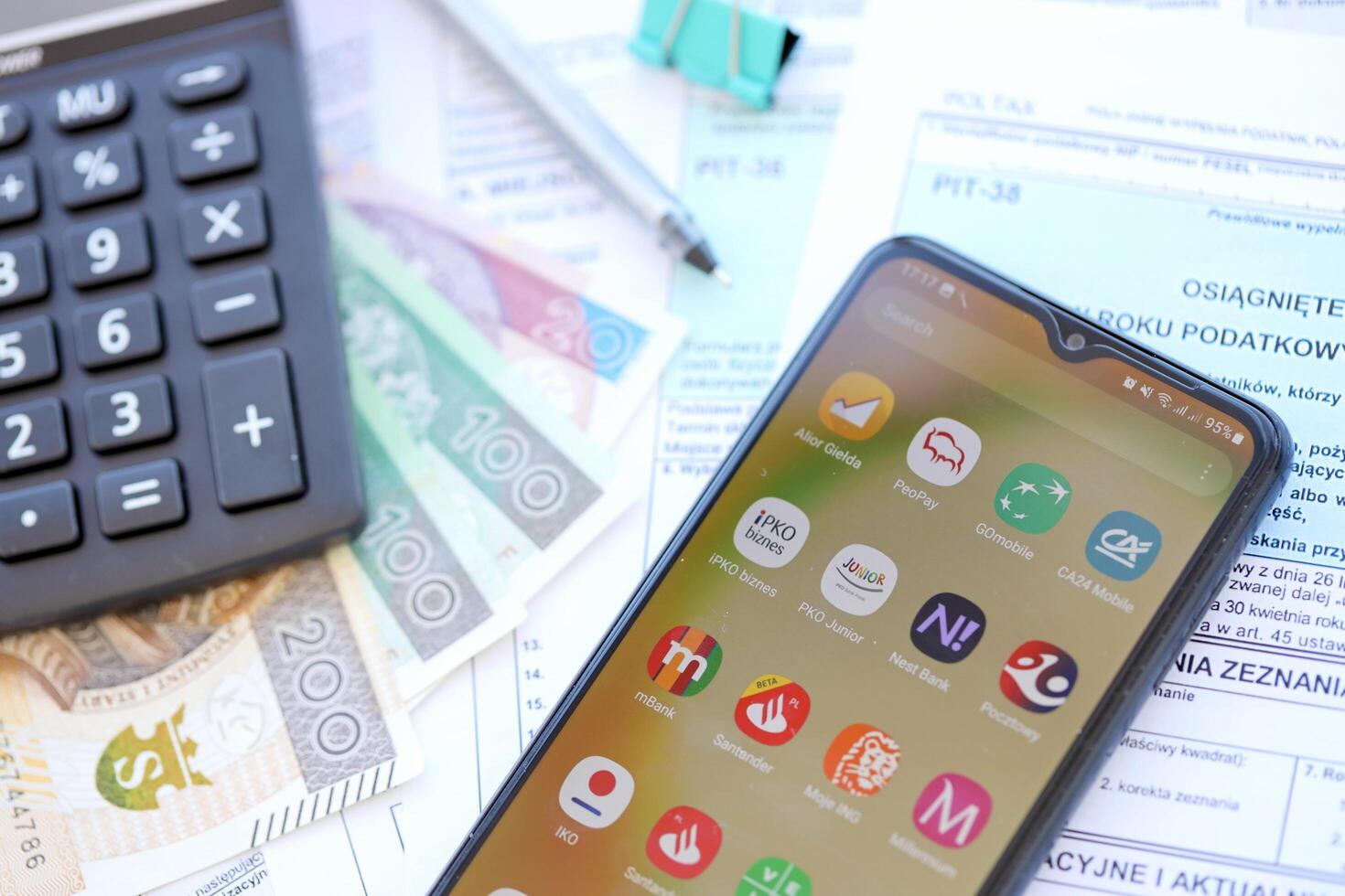 TERNOPIL, UKRAINE - AUGUST 3, 2023 Banking applications on screen of display on smartphone. Official apps of famous polish banks photo