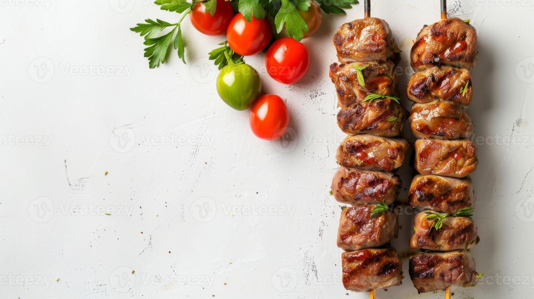 Grilled chicken skewers with fresh tomatoes and green parsley on a white background photo