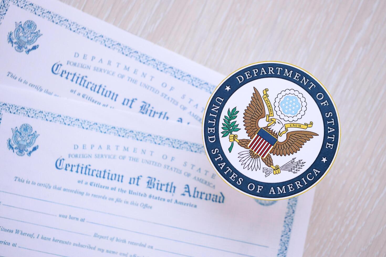 KYIV, UKRAINE - MARCH 9, 2024 US Department of State seal on Certification of Birth Abroad photo