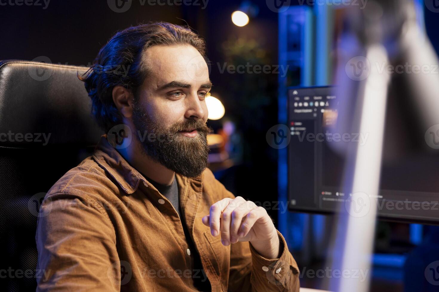 Joyful cybersecurity expert happy after finding security vulnerabilities and preventing malware infections. Upbeat developer content with installed fortified code preventing cyberattacks photo