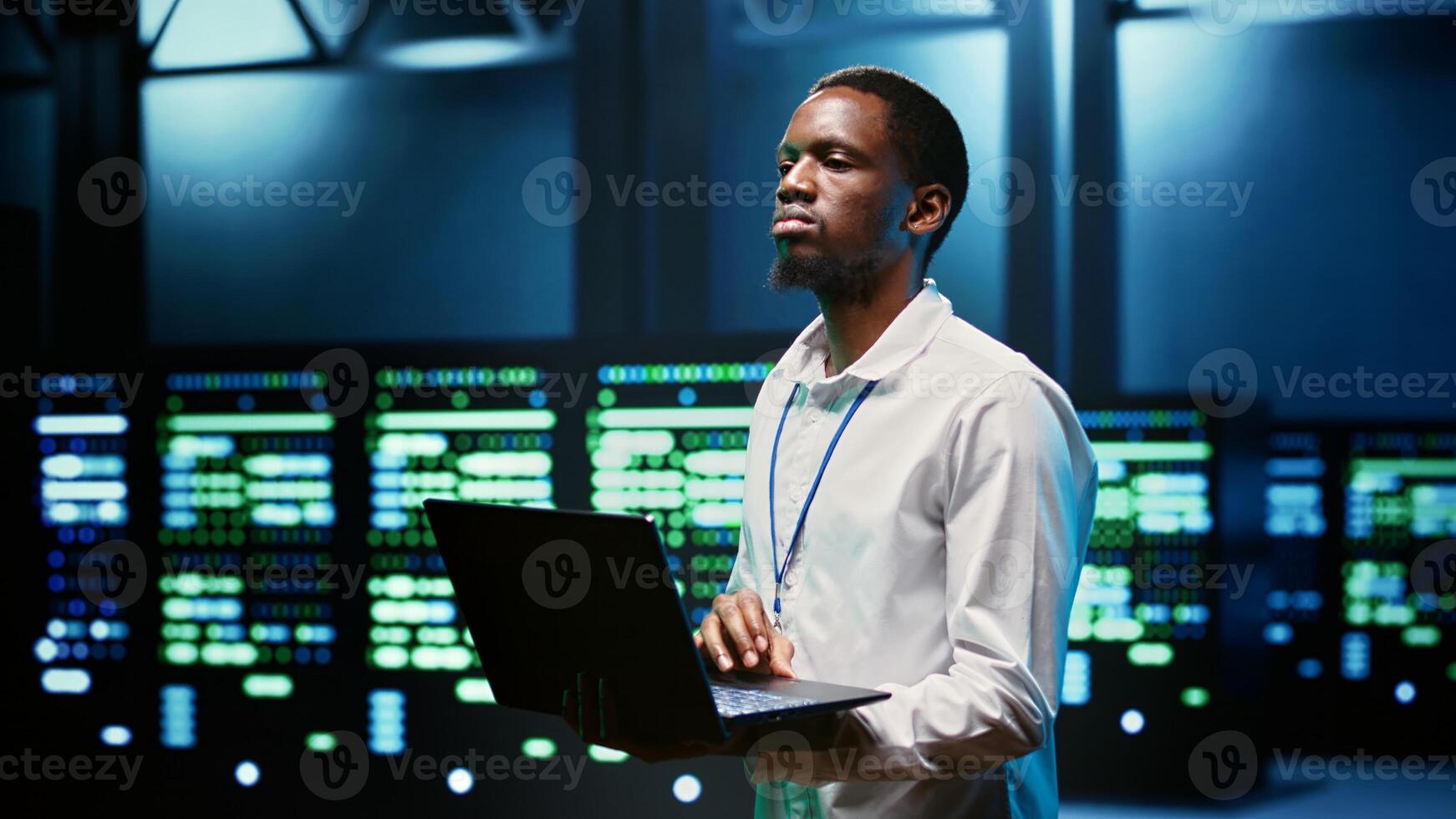African american specialist in high tech establishment mending network problems affecting server clusters performance and connectivity, leading to slow data transfer rates photo
