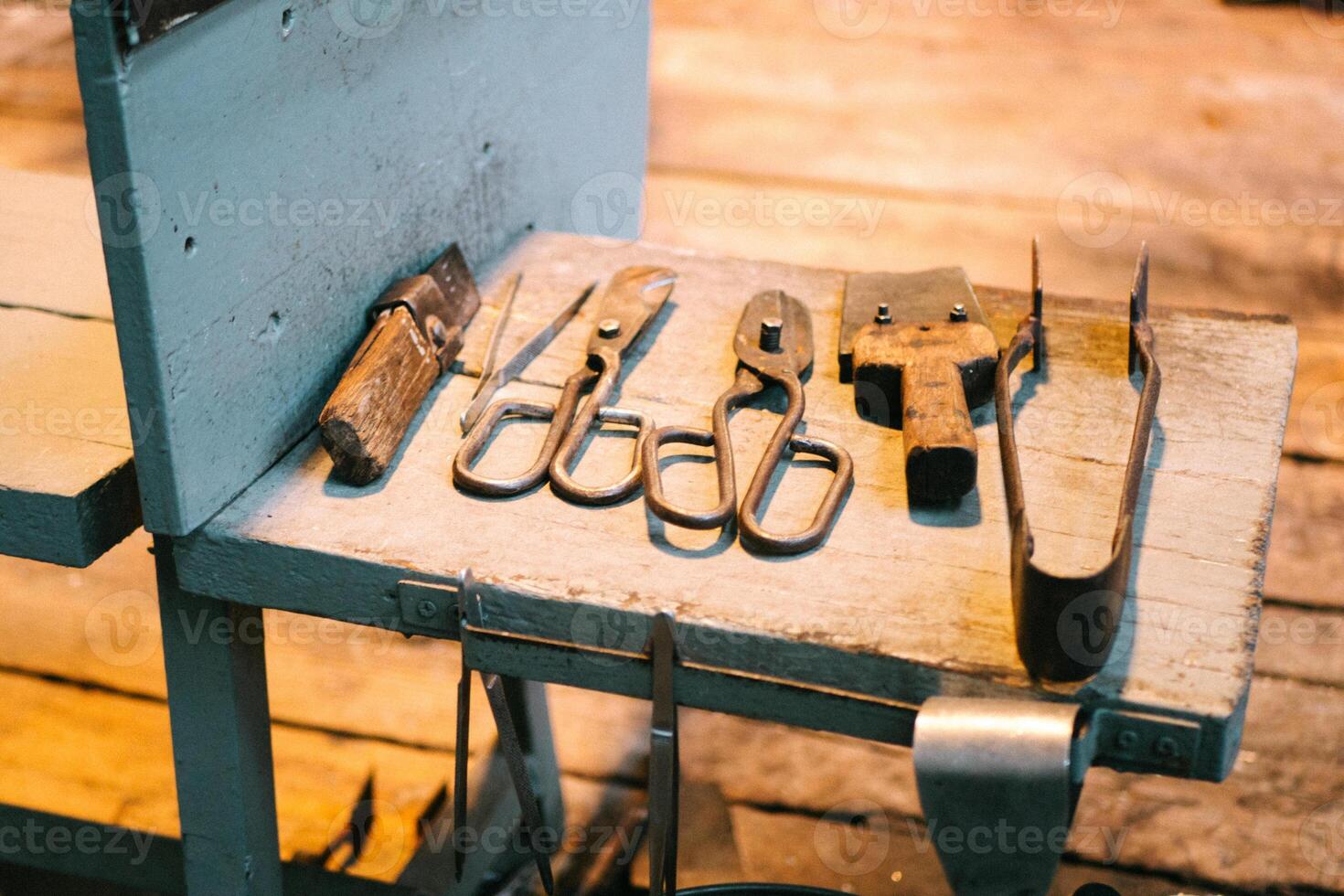 Metal Tools Laid Out to Process Molten Glass photo
