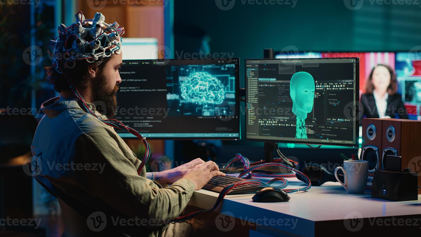 Computer engineer using EEG headset, starting mind upload process using brain machine interface. Man using neuroscientific device to transfer consciousness into cyberspace, typing code, camera A photo