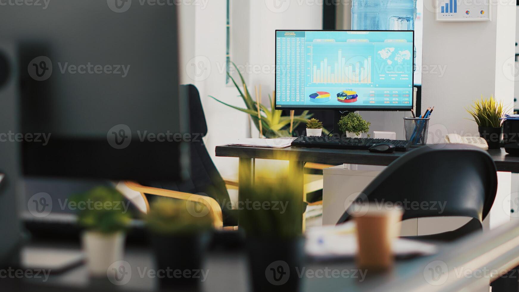 Computer screen in business office shows stock exchange values changing in real time. Desktop PC monitor in workplace with trading indexes showing prices and pie charts graphs photo