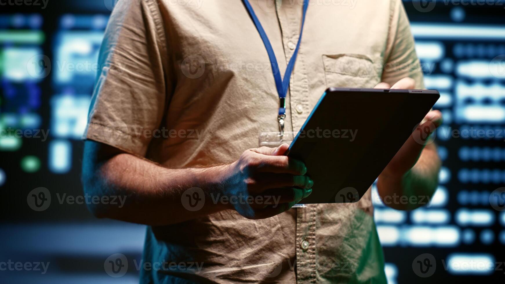 Close up of specialist in high tech facility providing secure, scalable, and reliable infrastructure for storing, processing, and analyzing large amounts of data generated by artificial intelligence photo