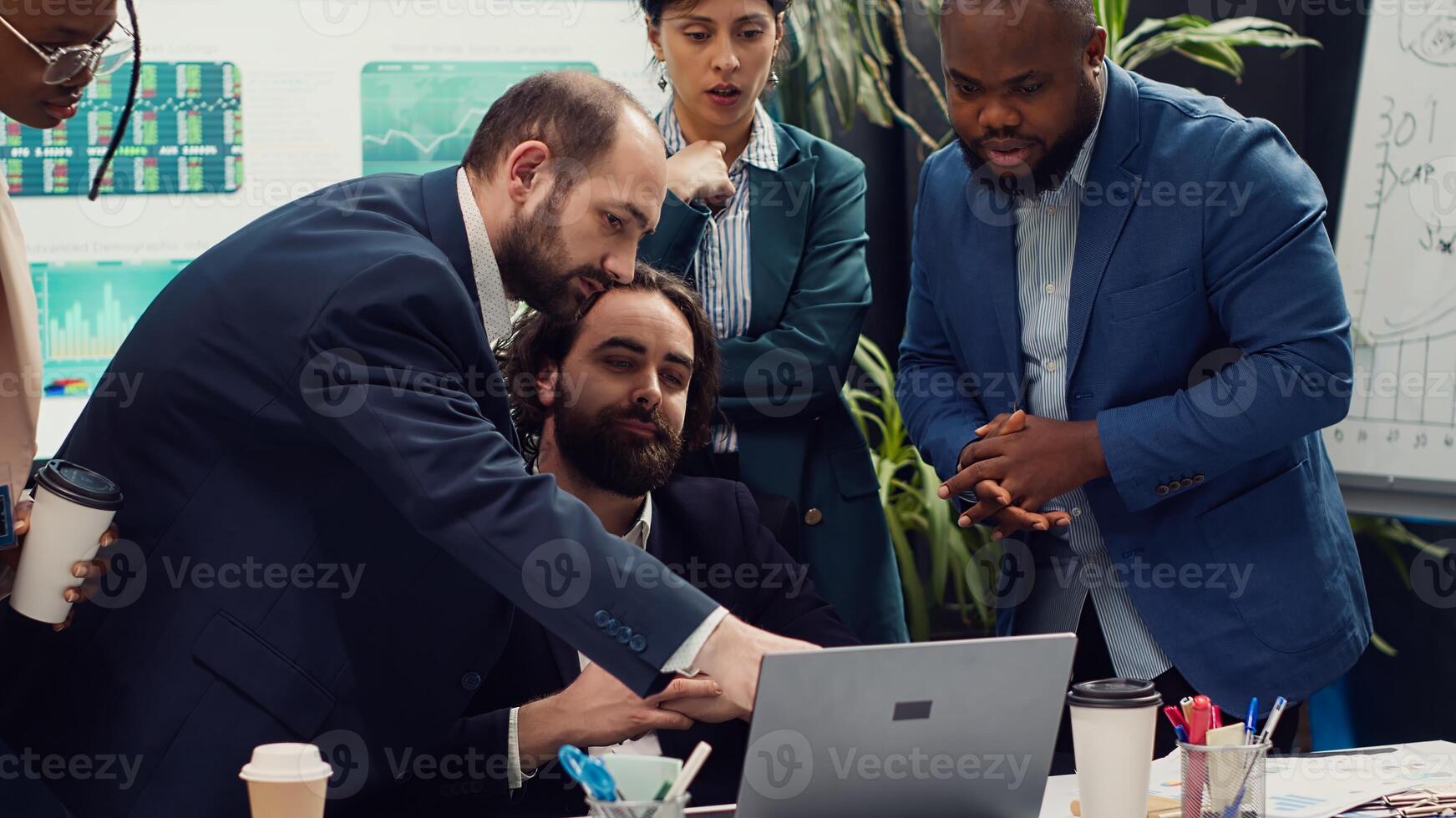 Research team presenting all insight and statistics data they found online, briefing their manager about the work progress and achievements. Employees showing gathered info. Camera A. photo