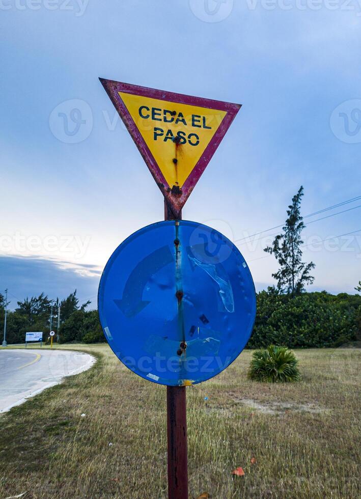 Shot of the very old road signs with give way words in Spanish.Concept photo