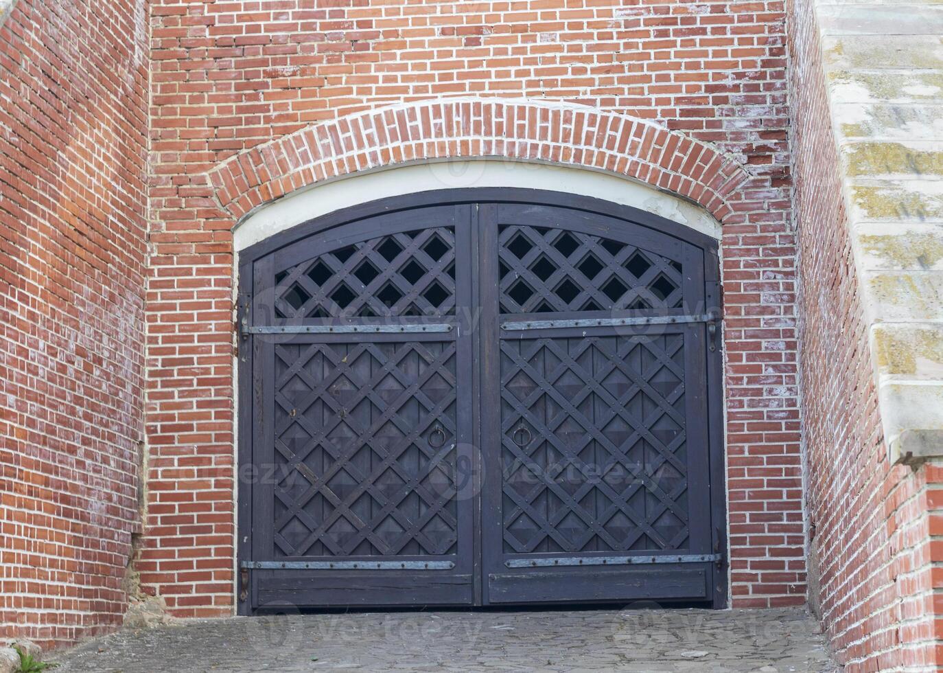 Close up shot of the old wooden gates. Background photo