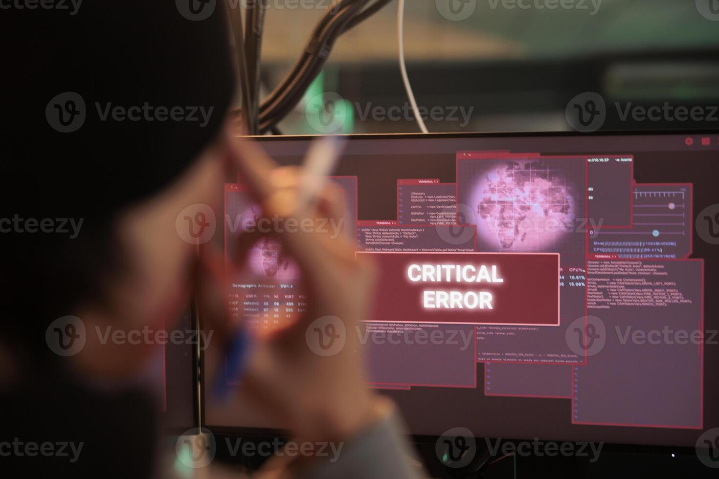 Critical error alert on computer screen, unsuccessful system hacking, cyberattack. Encryption specialist solving internet virus attack, data breach, hacker stealing privacy information photo