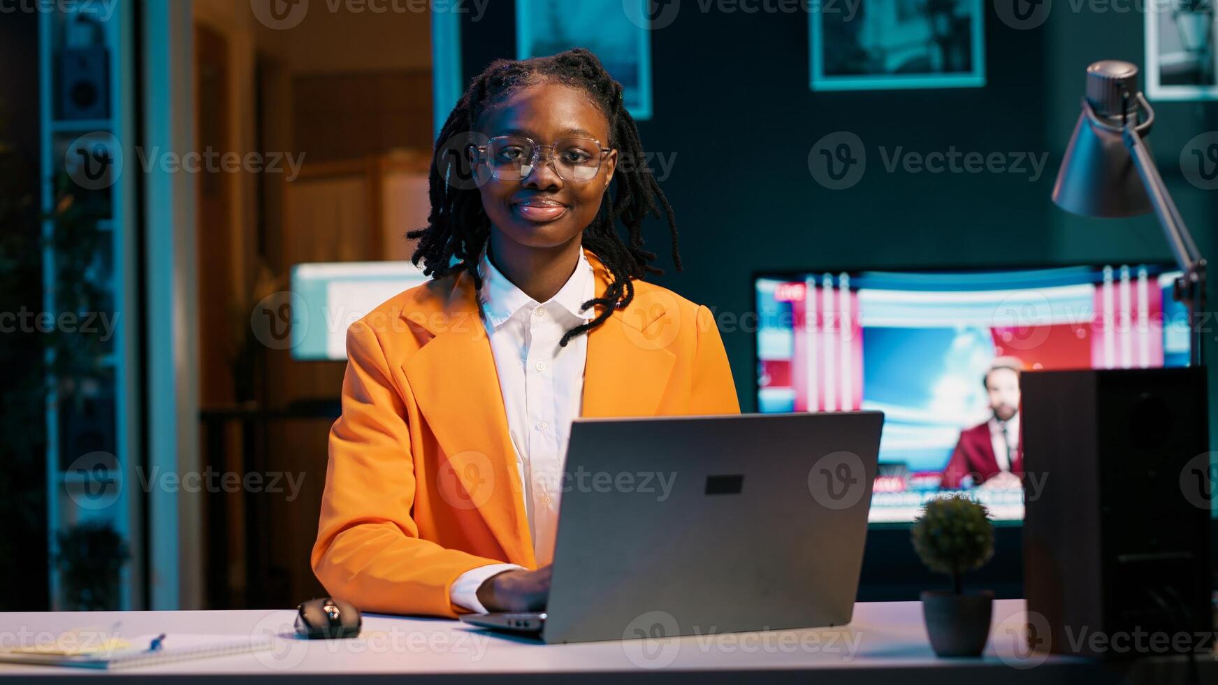 Portrait of dedicated pupil studying class materials and notes to increase knowledge, working from home on her projects. Student researching for assignments using web libraries. Camera A. photo