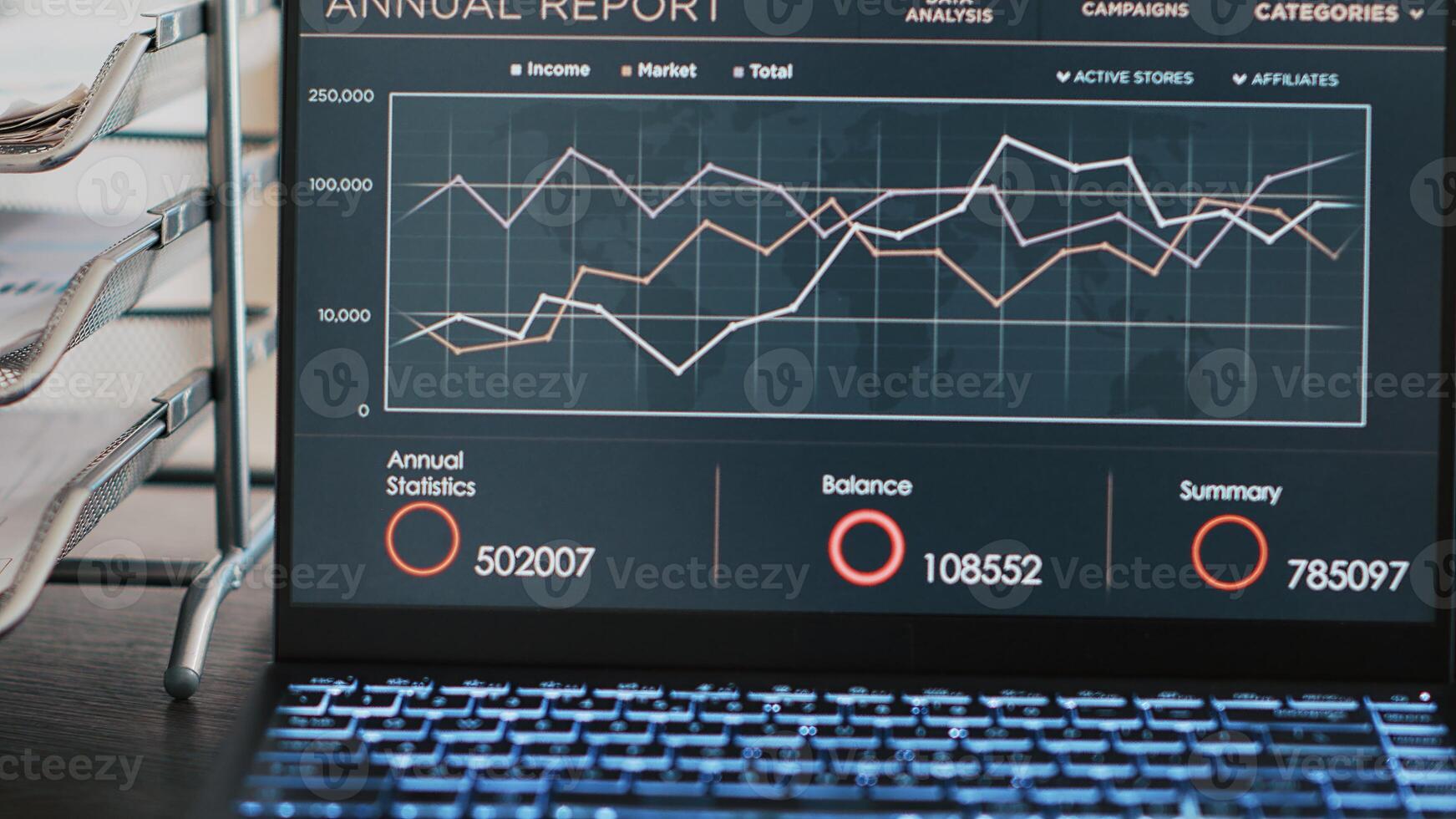 Business forecasting graphs and numbers on laptop monitor showing upward profit trend concept. Economic annual revenue statistics report on notebook screen in marketing department office, close up photo