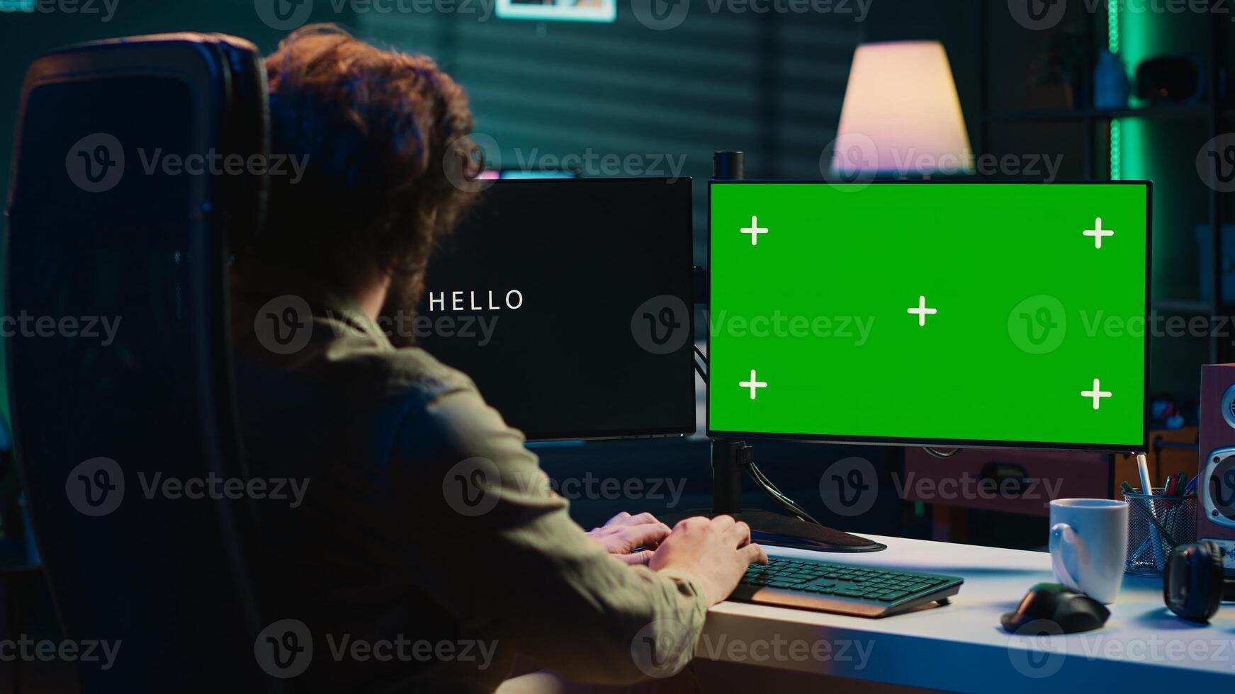 Programmer updating artificial intelligence algorithm using green screen PC, making it become sentient. IT specialist programming self aware AI with mockup computer, camera A photo