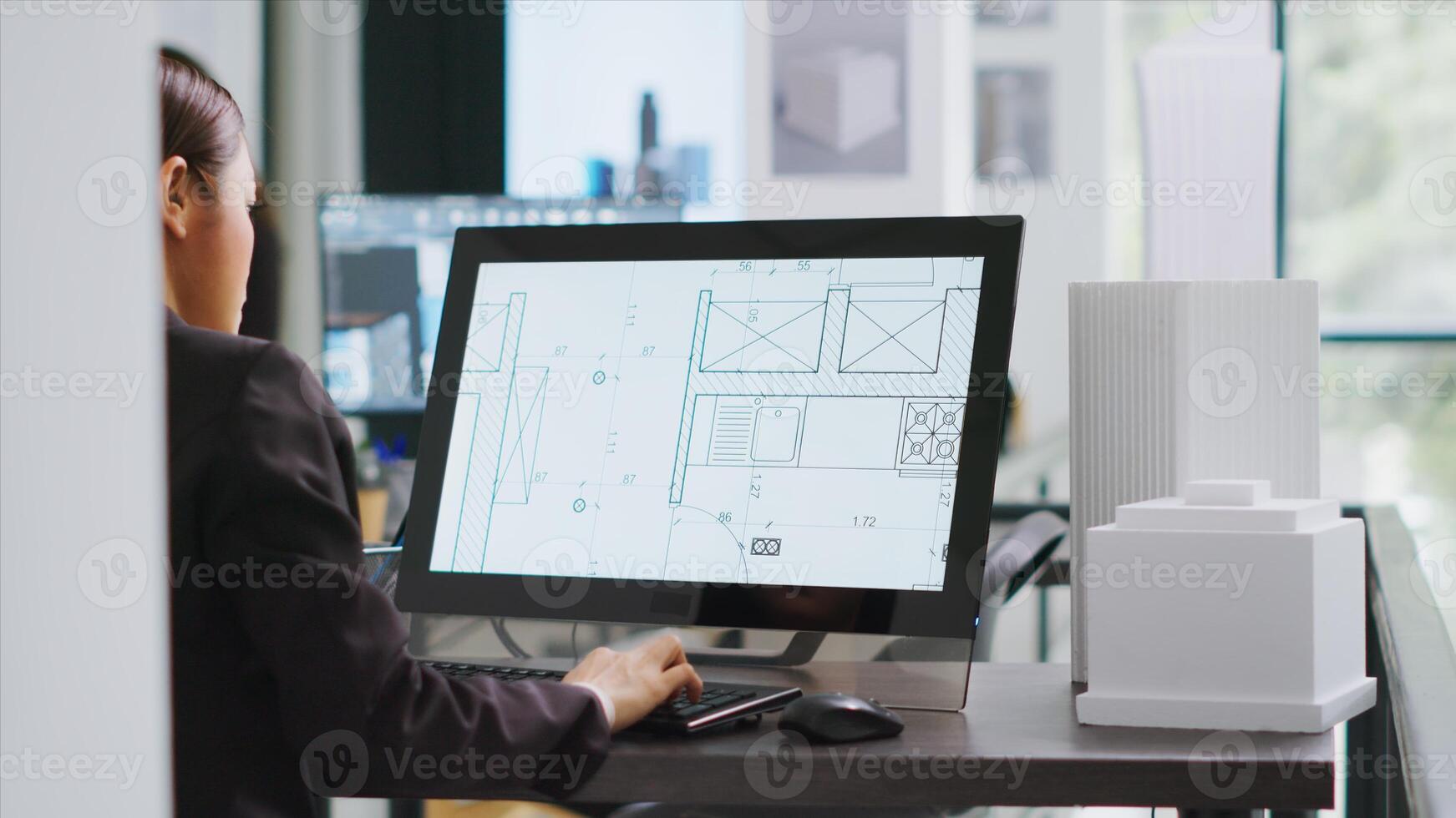 Technician operating on cad software to create blueprint for new architectural scaling project, using industrial elements in coworking space. Developer designing creative sketch. Handheld shot. photo