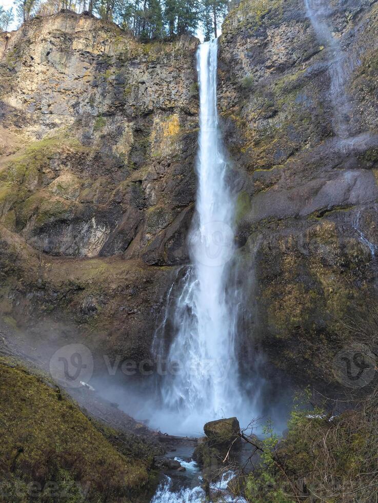 Close-up of the roaring Multnomah Falls from the Multnomah Creek Bridge on a February day. photo