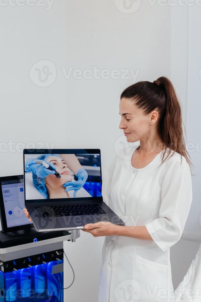 Facial skin care machine in spa clinic for anti-aging or acne treatment. The concept of aesthetic medicine, beauty tools, latest technologies in beauty industry photo