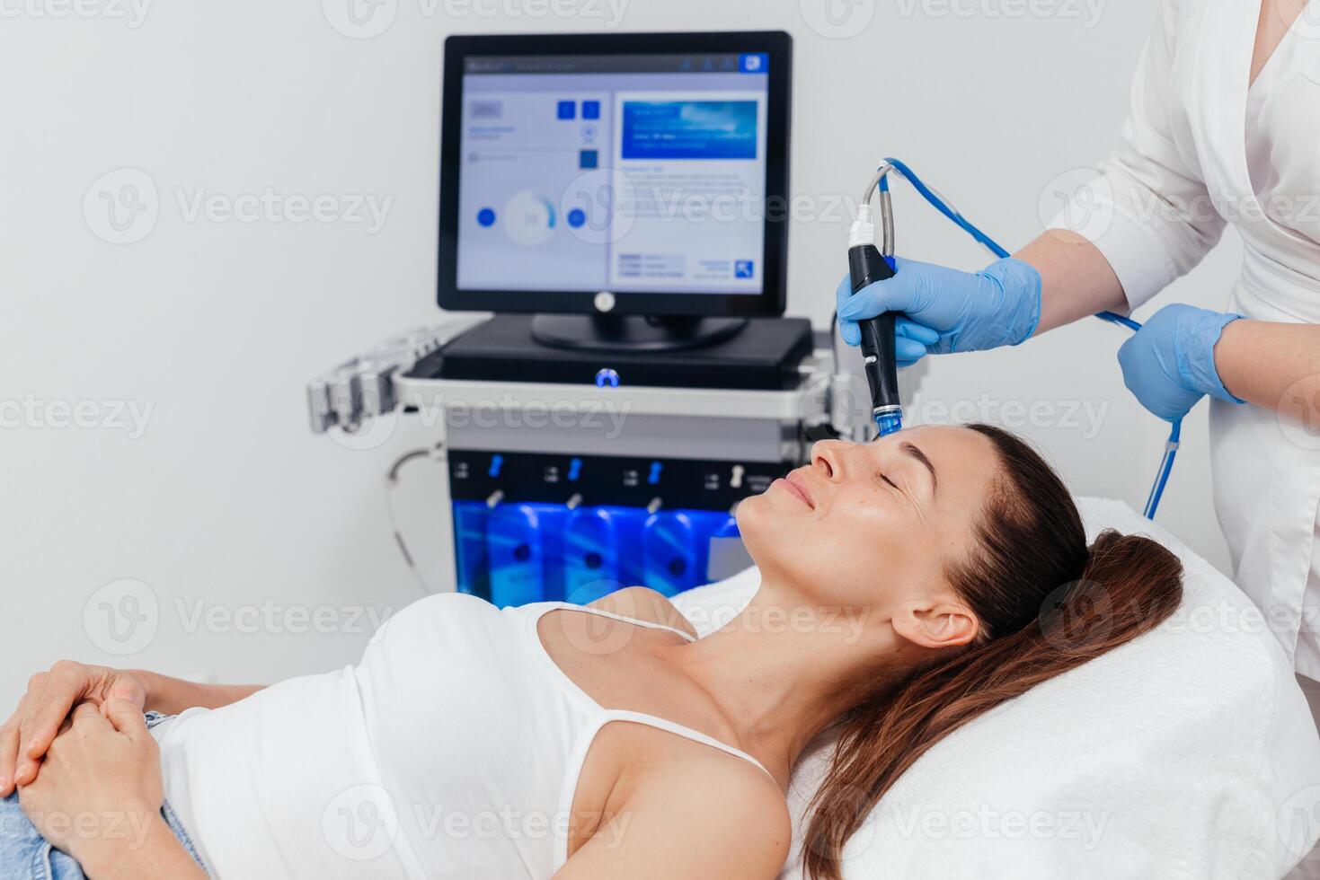 Mature, middle aged woman receiving facial procedure of cleansing the skin. Portrait and natural woman face with healthy freckle skin texture. Aesthetic, facial and skincare cosmetology photo