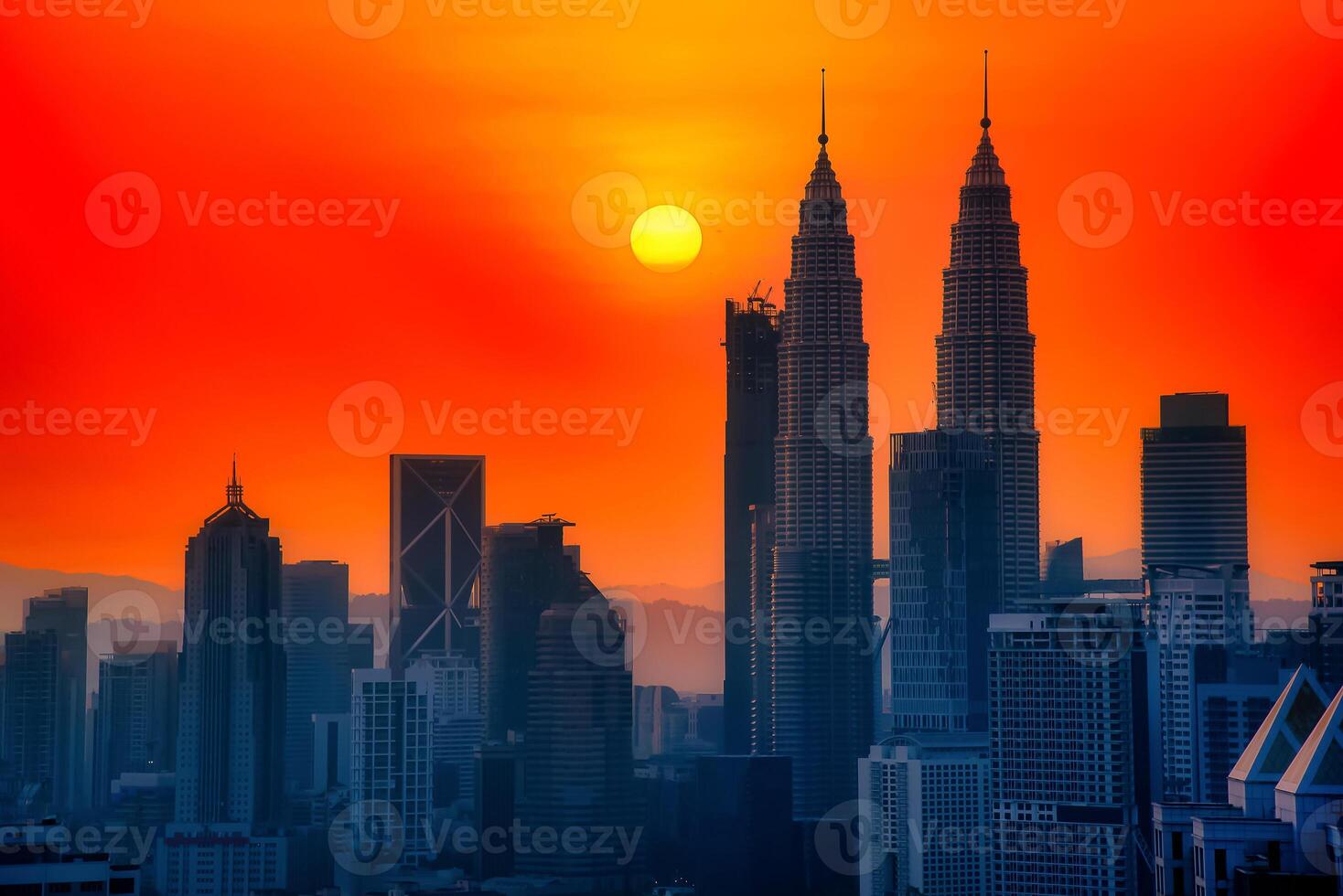 Silhouette Cityscape of Kuala lumpur city skyline at sunrise in Malaysia. photo