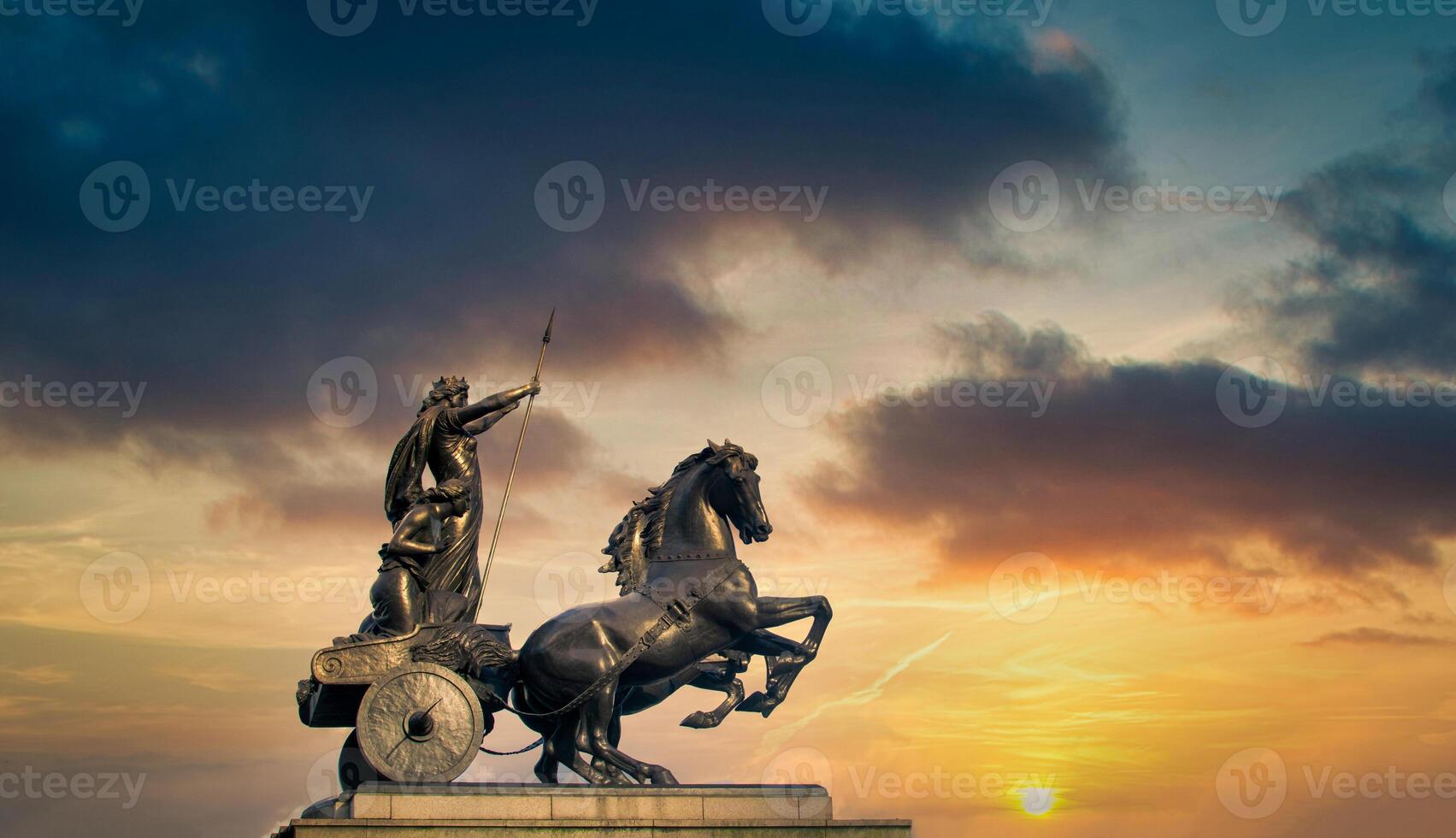 Statue of Boadicea Boudicca Queen at sunset in London, UK photo