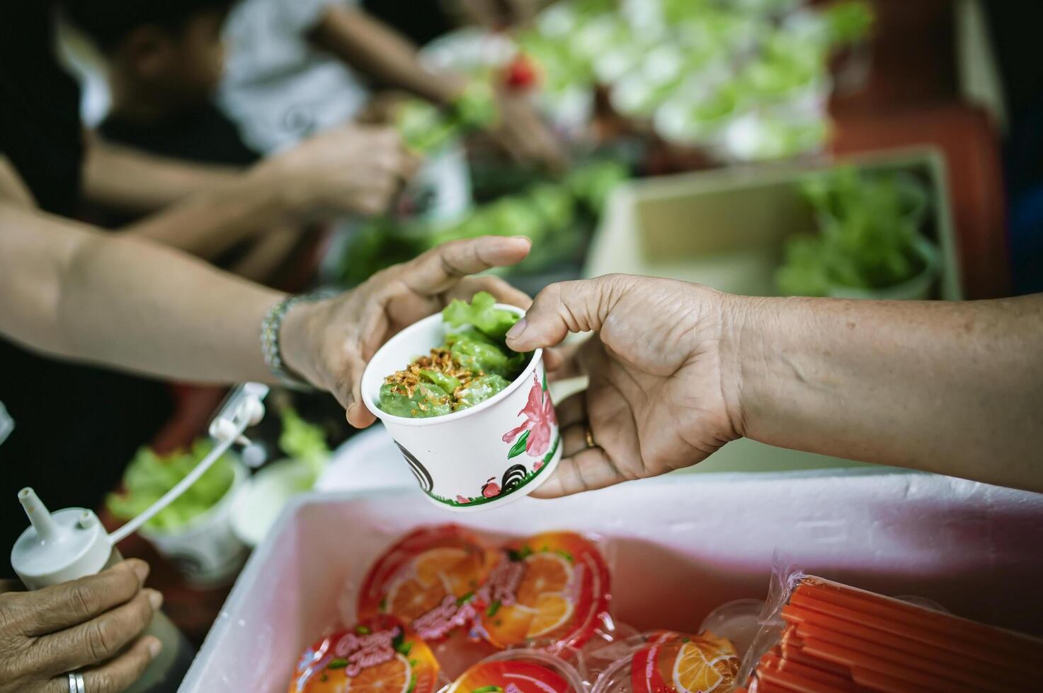 hands of the poor receive food from the donor's share. poverty concept photo