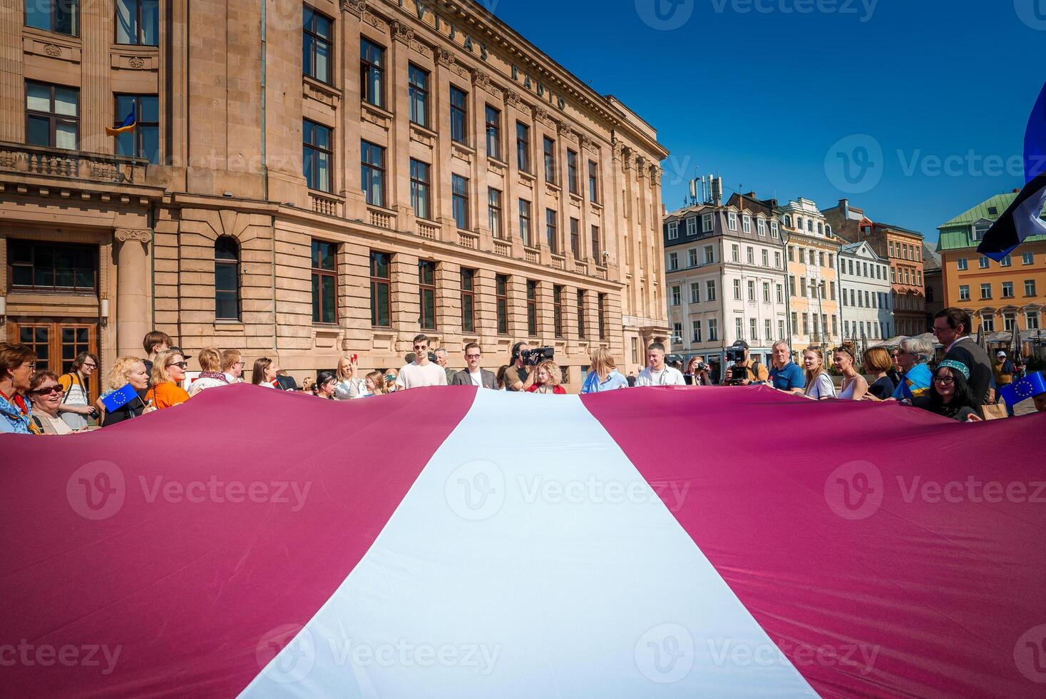 Crowd celebrates Latvia's EU milestone in historic Riga square photo