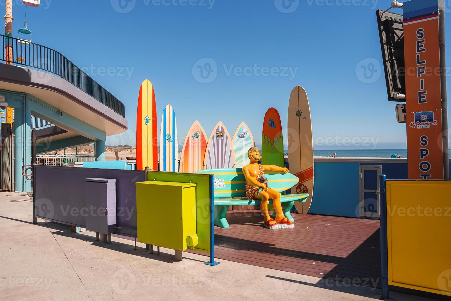 Vibrant Surf Culture Scene with Divrse Surfboard Display on Beach Boardwalk photo