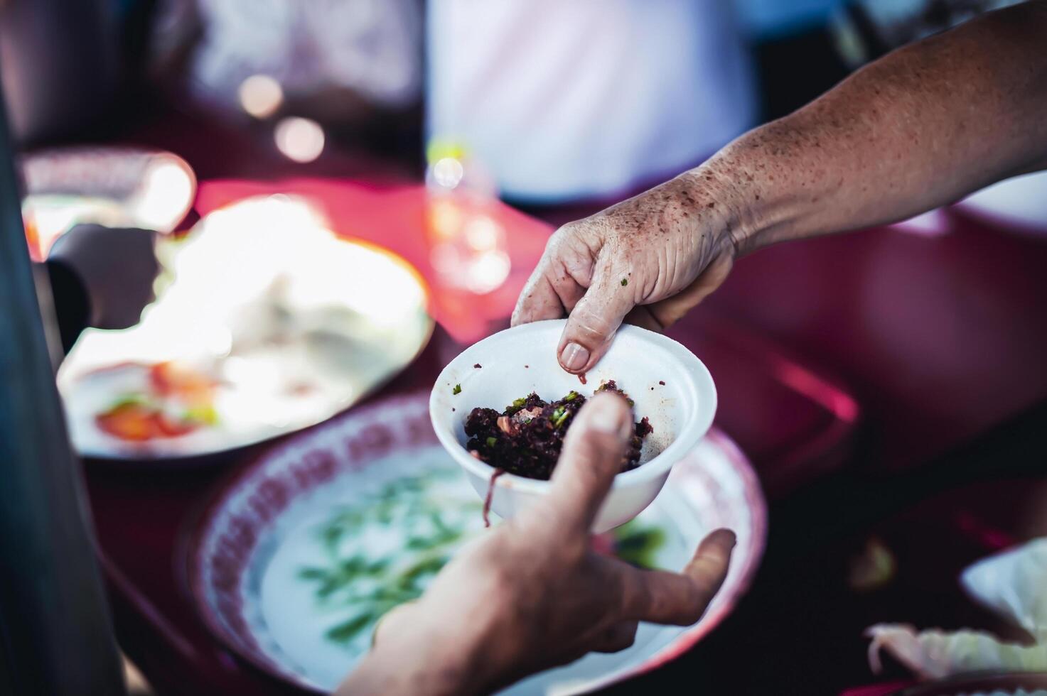 The concept of sharing. Participation in sharing food for the poor photo