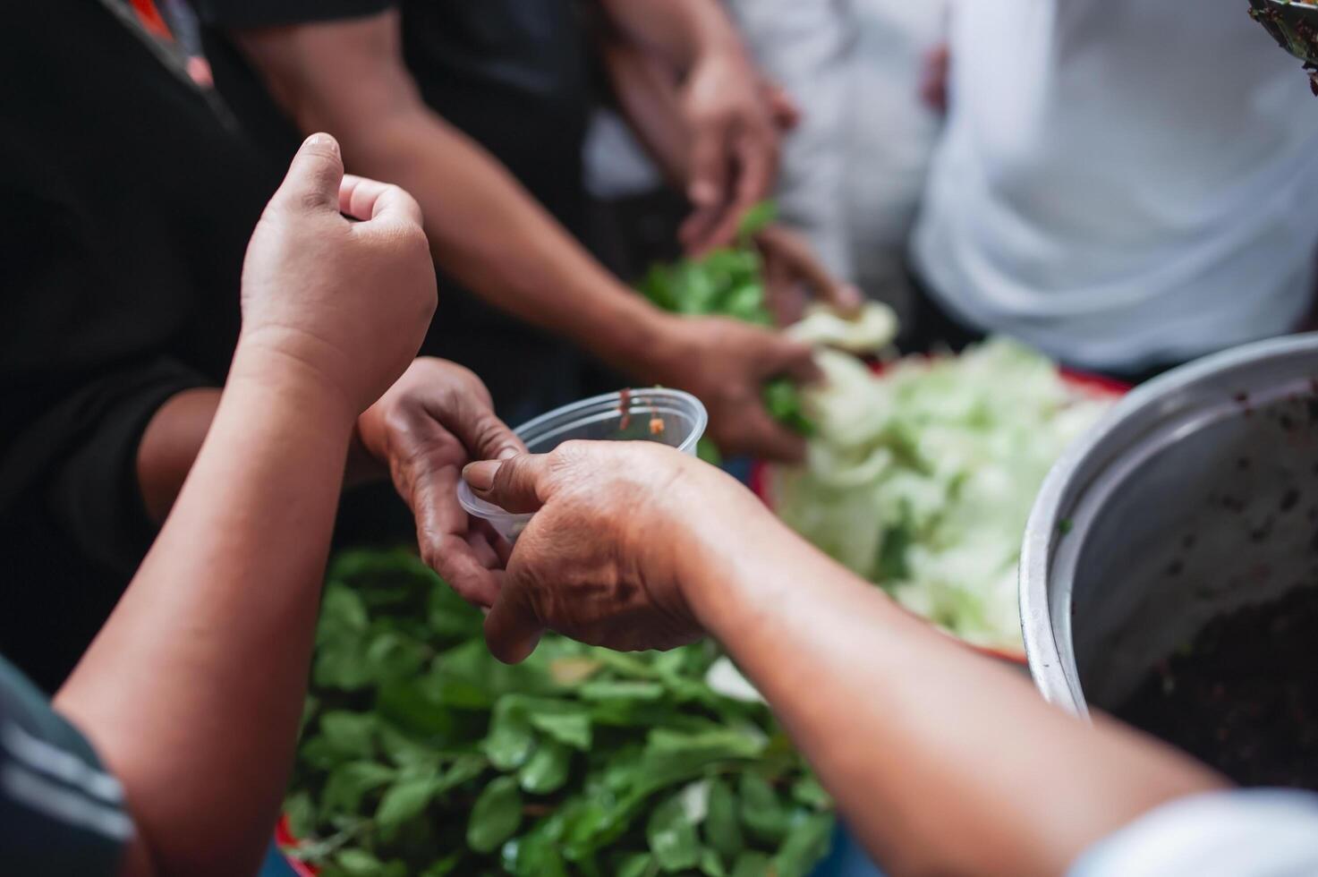 Feeding the poor to help each other in society. Charity concept photo