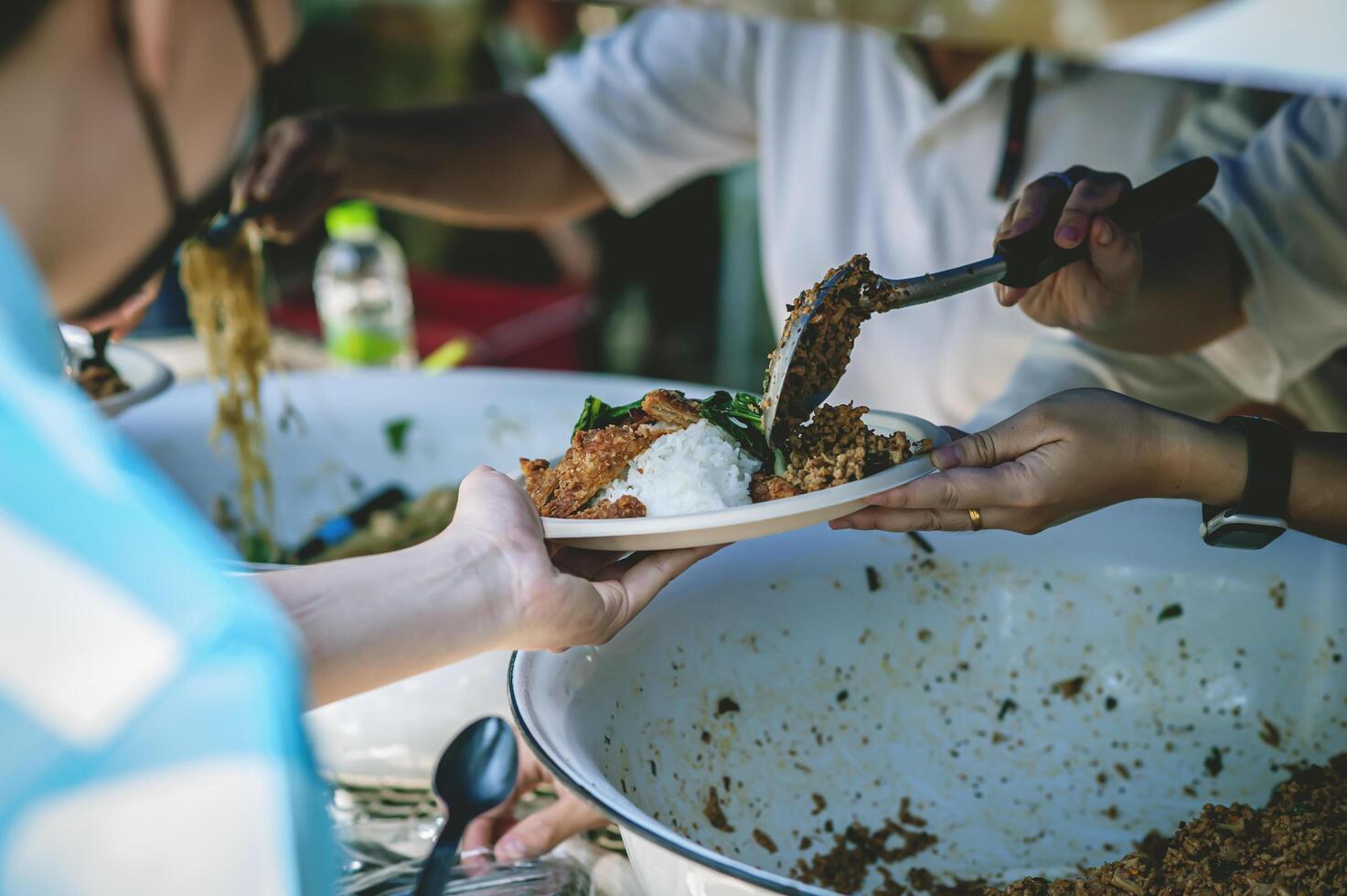 Sharing food with the poor. Ideas for helping with hunger problems photo