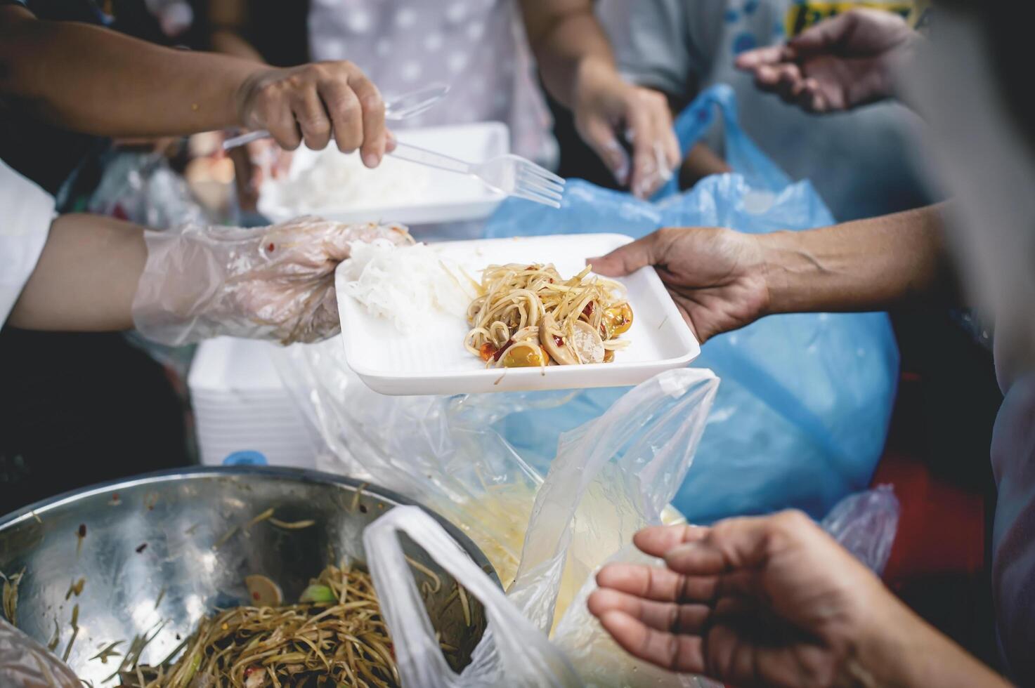 Sharing food with the poor. Ideas for helping with hunger problems photo