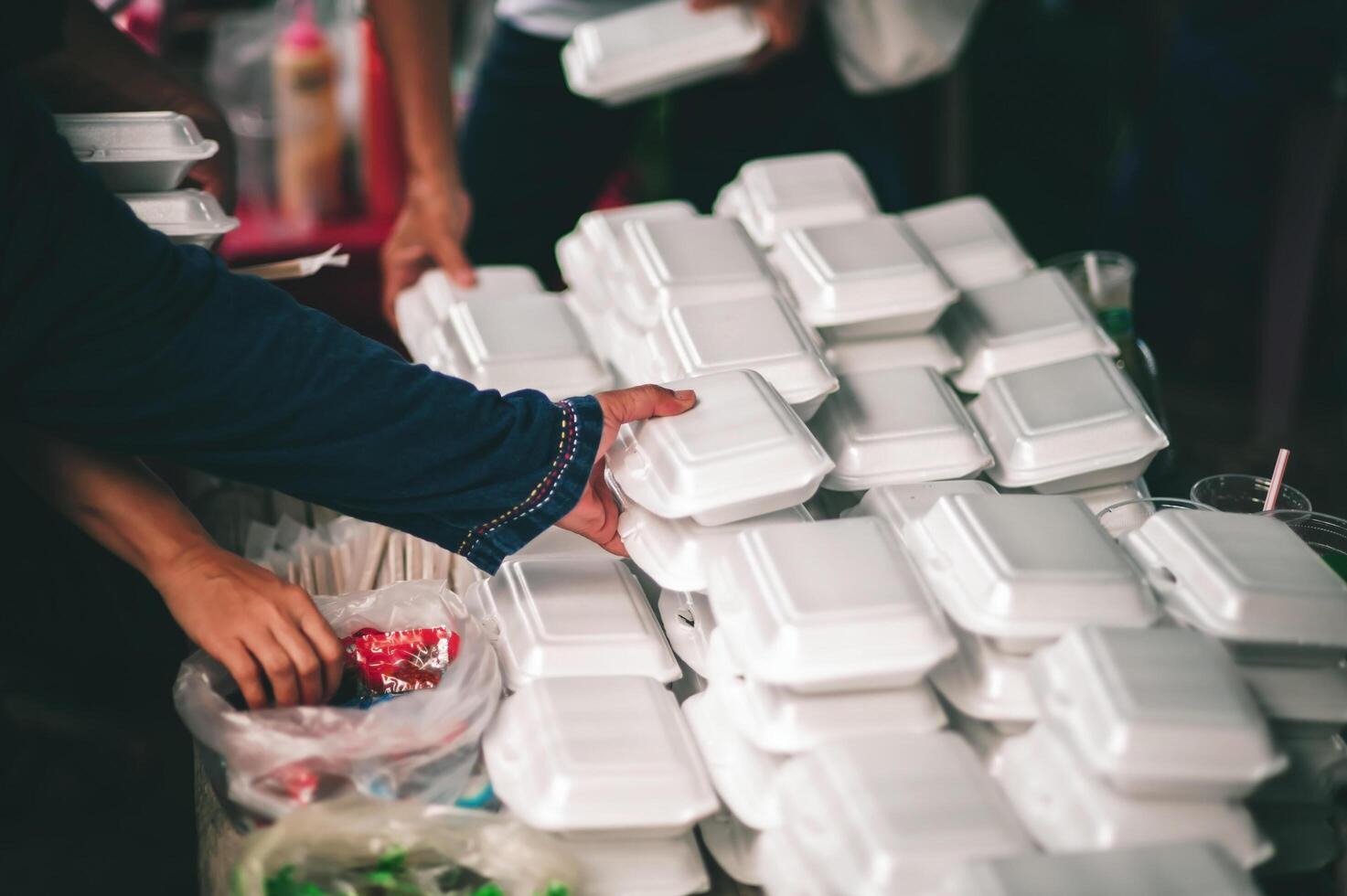 Food assistance to the homeless poor from volunteers concepts of public hunger. photo