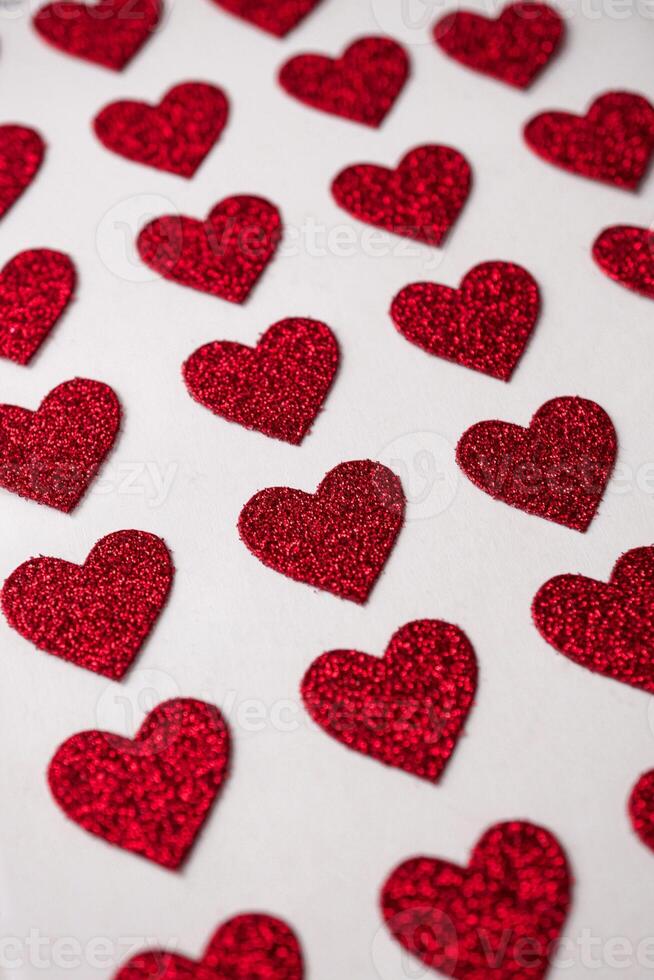 red heart shapes on the white background in valentine's day photo