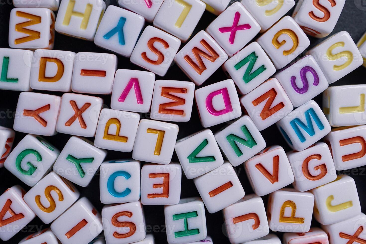 Colorful letter cubes, toy and education photo