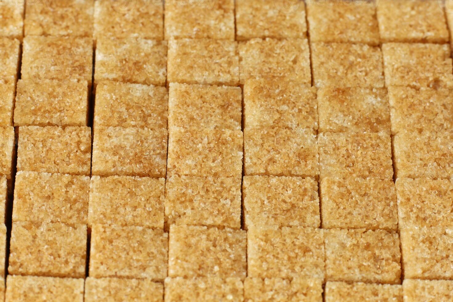 Brown cane sugar in cubes photo