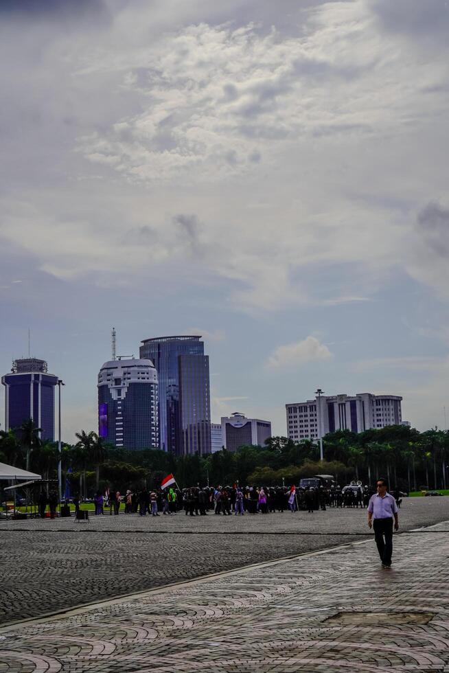 Central Jakarta, January 30, 2024 - beautiful view of skyscrapers with a bright afternoon sky. photo
