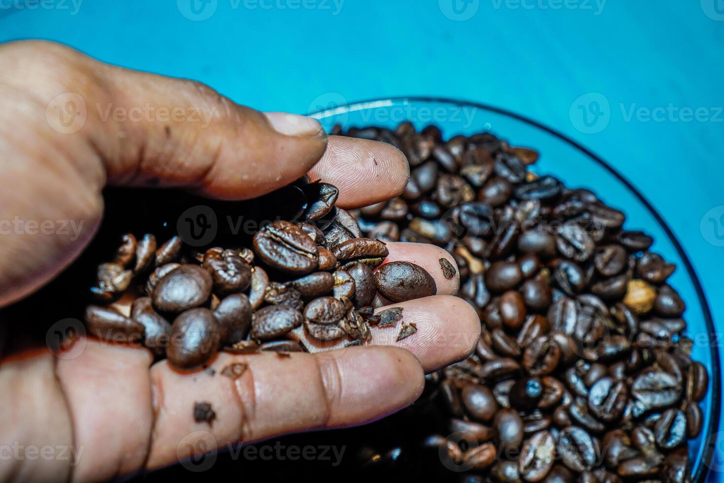 Close-up view of black coffee beans after roasting. photo