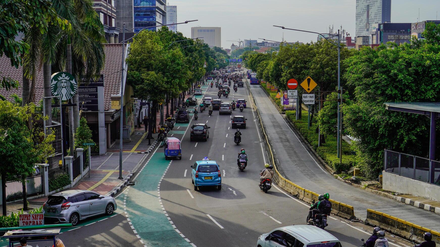 Central Jakarta, January 30, 2024 - top view of traffic flow on the streets of downtown Jakarta. photo