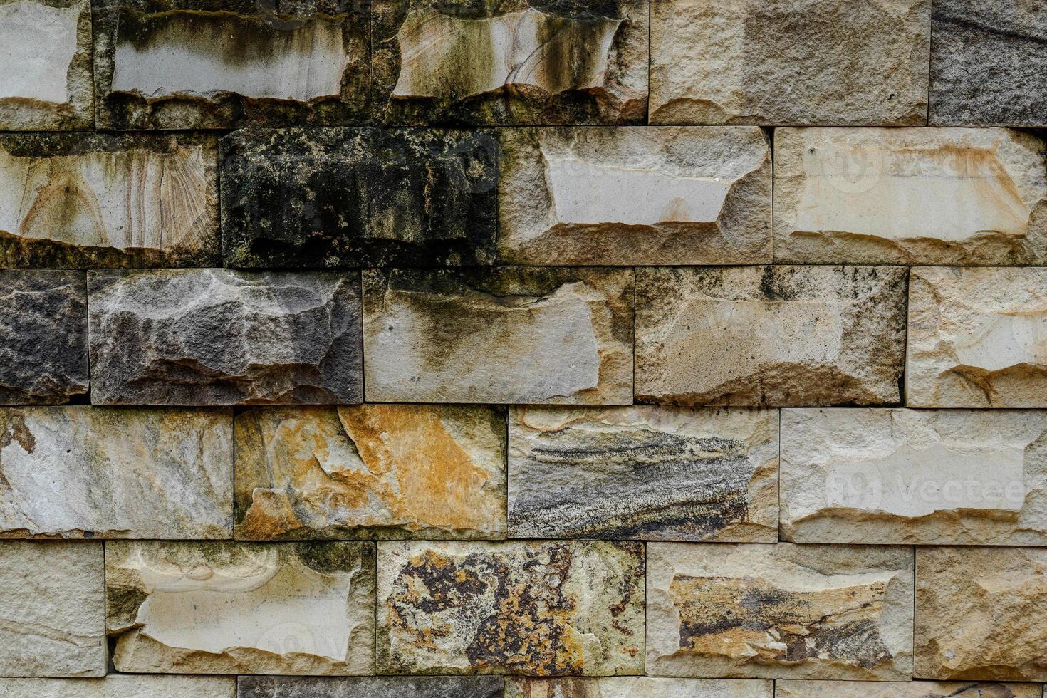 Close up view of old stone textured building dingding. photo