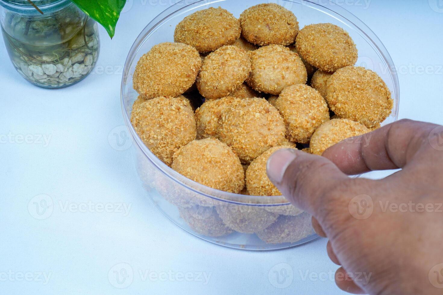 Close-up view of chestnut cake on table with white background. photo