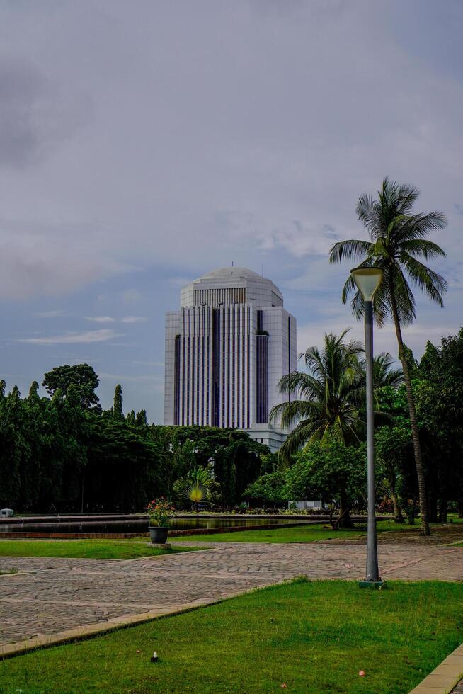 Central Jakarta, January 30, 2024 - beautiful view of skyscrapers with a bright afternoon sky. photo