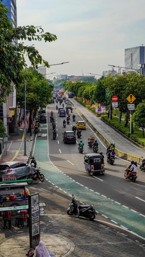 Central Jakarta, January 30, 2024 - top view of traffic flow on the streets of downtown Jakarta. photo
