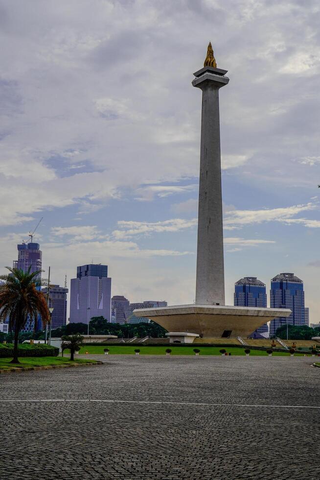 Central Jakarta, January 30, 2024 - beautiful view of the national monument with clear skies during the day. photo