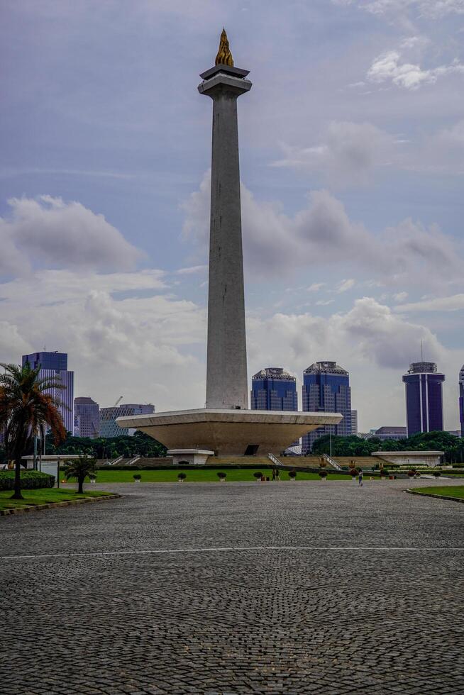 Central Jakarta, January 30, 2024 - beautiful view of the national monument with clear skies during the day. photo